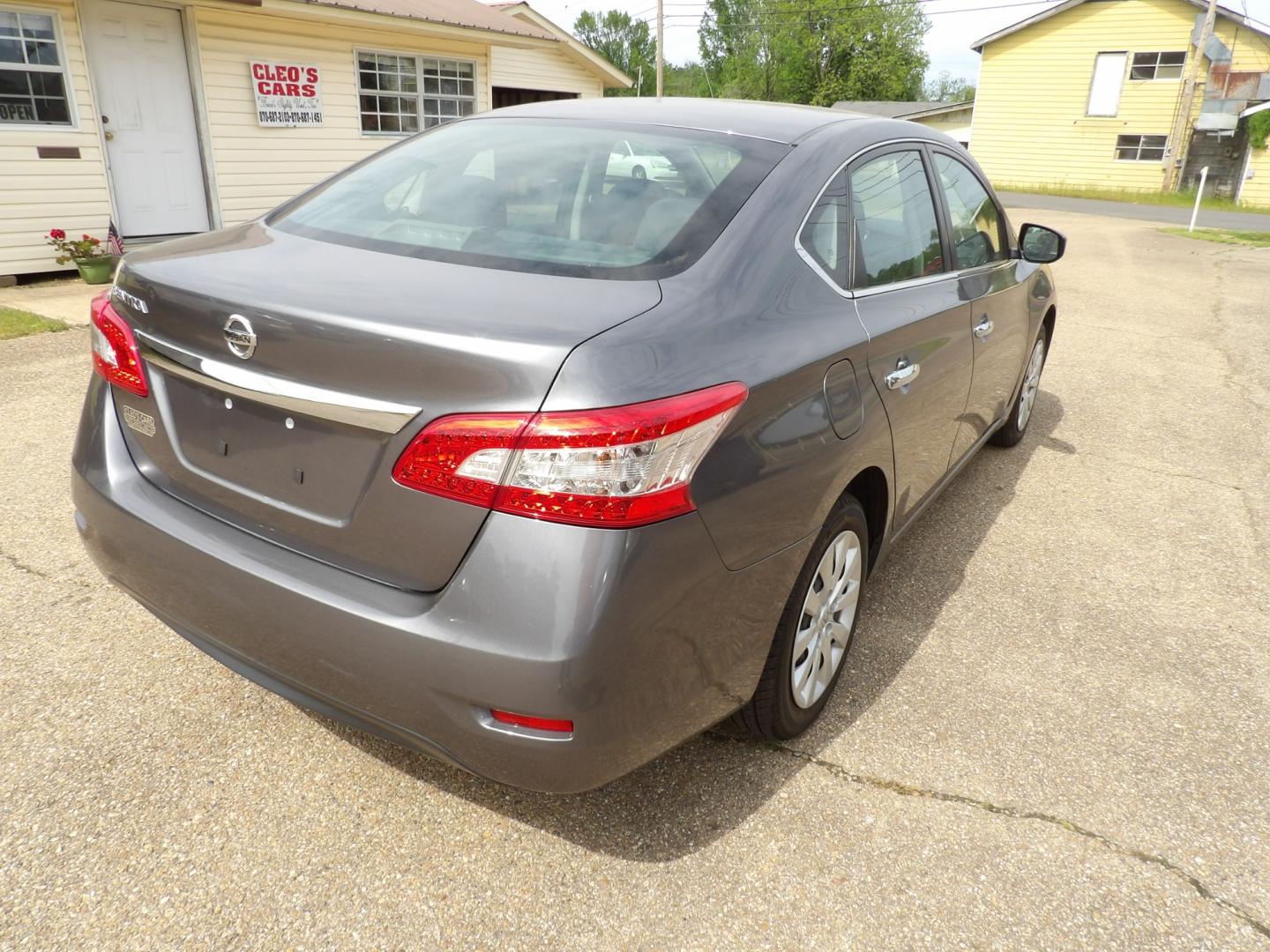 2015 Brilliant Silver /Black Nissan Sentra S 6MT (3N1AB7APXFY) with an 1.8L L4 SFI DOHC 16V engine, 6-Speed automatic transmission, located at 401 First NE, Bearden, AR, 71720, (870) 687-3414, 33.726528, -92.611519 - Photo#16