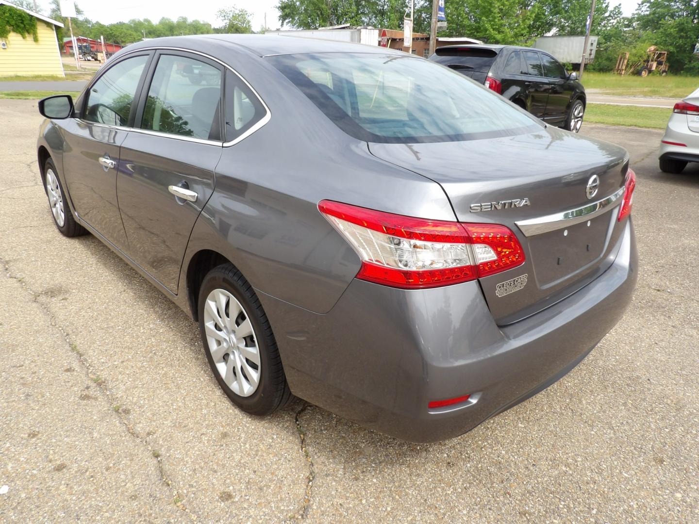 2015 Brilliant Silver /Black Nissan Sentra S 6MT (3N1AB7APXFY) with an 1.8L L4 SFI DOHC 16V engine, 6-Speed automatic transmission, located at 401 First NE, Bearden, AR, 71720, (870) 687-3414, 33.726528, -92.611519 - Photo#2