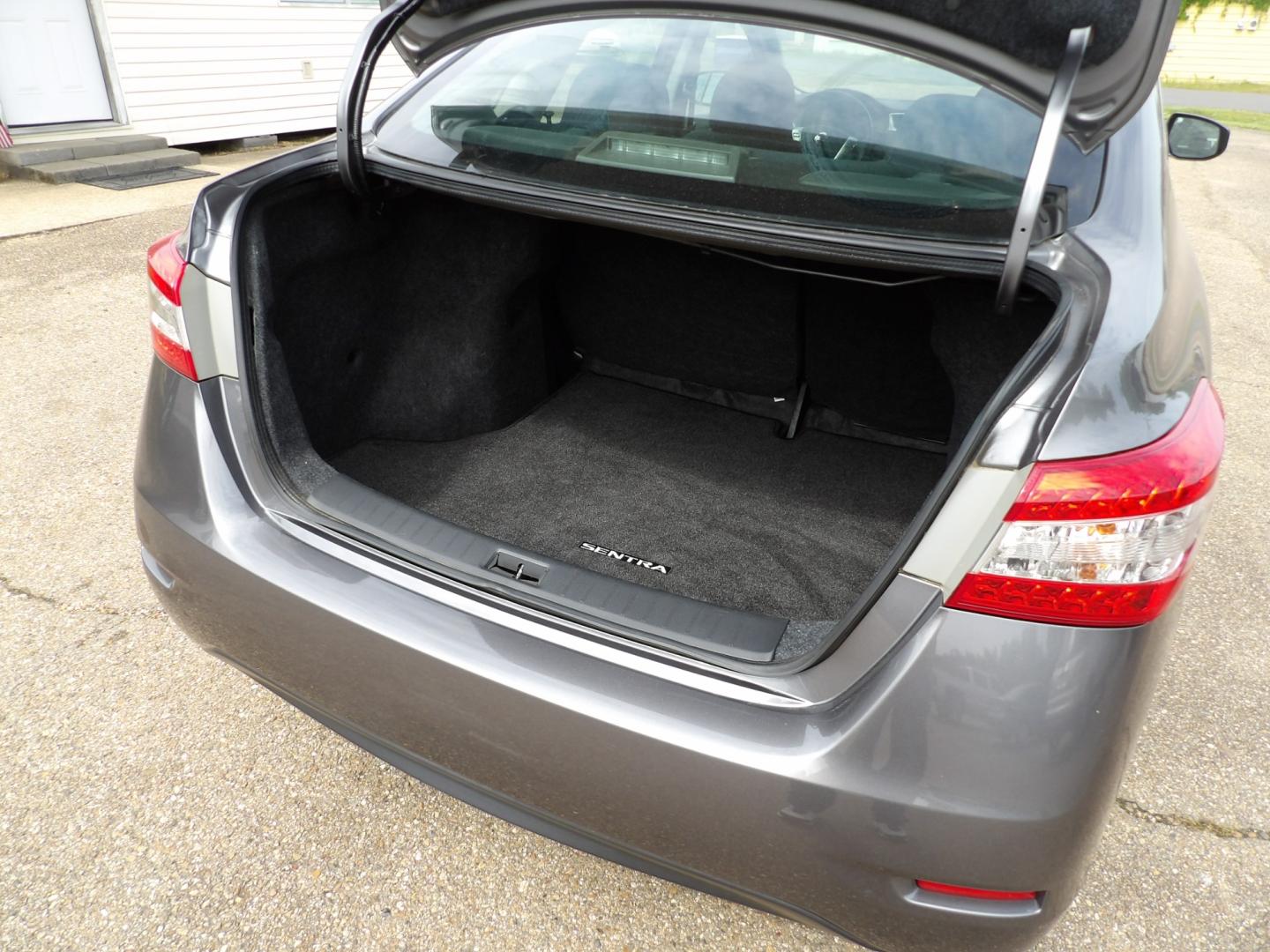 2015 Brilliant Silver /Black Nissan Sentra S 6MT (3N1AB7APXFY) with an 1.8L L4 SFI DOHC 16V engine, 6-Speed automatic transmission, located at 401 First NE, Bearden, AR, 71720, (870) 687-3414, 33.726528, -92.611519 - Photo#3