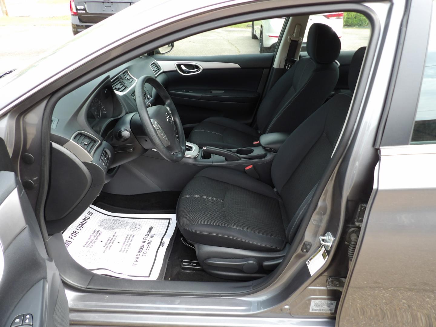 2015 Brilliant Silver /Black Nissan Sentra S 6MT (3N1AB7APXFY) with an 1.8L L4 SFI DOHC 16V engine, 6-Speed automatic transmission, located at 401 First NE, Bearden, AR, 71720, (870) 687-3414, 33.726528, -92.611519 - Photo#7