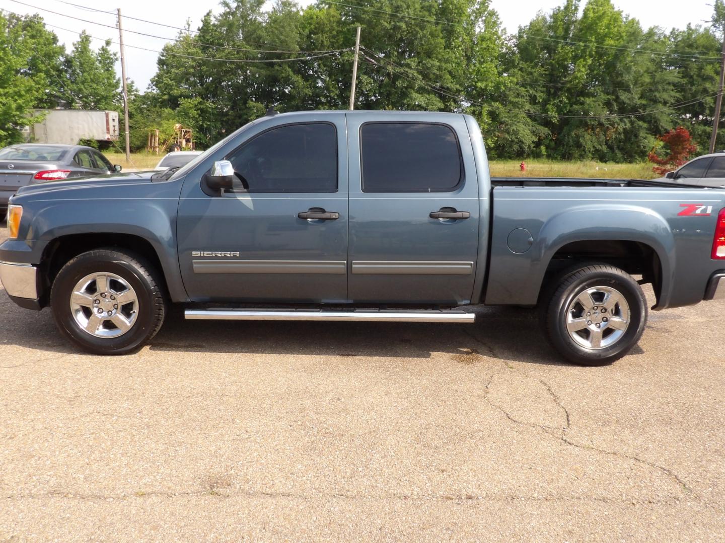 2012 Teal Blue Metallic /Black GMC Sierra 1500 SLE Crew Cab 2WD (3GTP1VE0XCG) with an 5.3L V8 OHV 16V FFV engine, 6-Speed Automatic transmission, located at 401 First NE, Bearden, AR, 71720, (870) 687-3414, 33.726528, -92.611519 - Photo#1