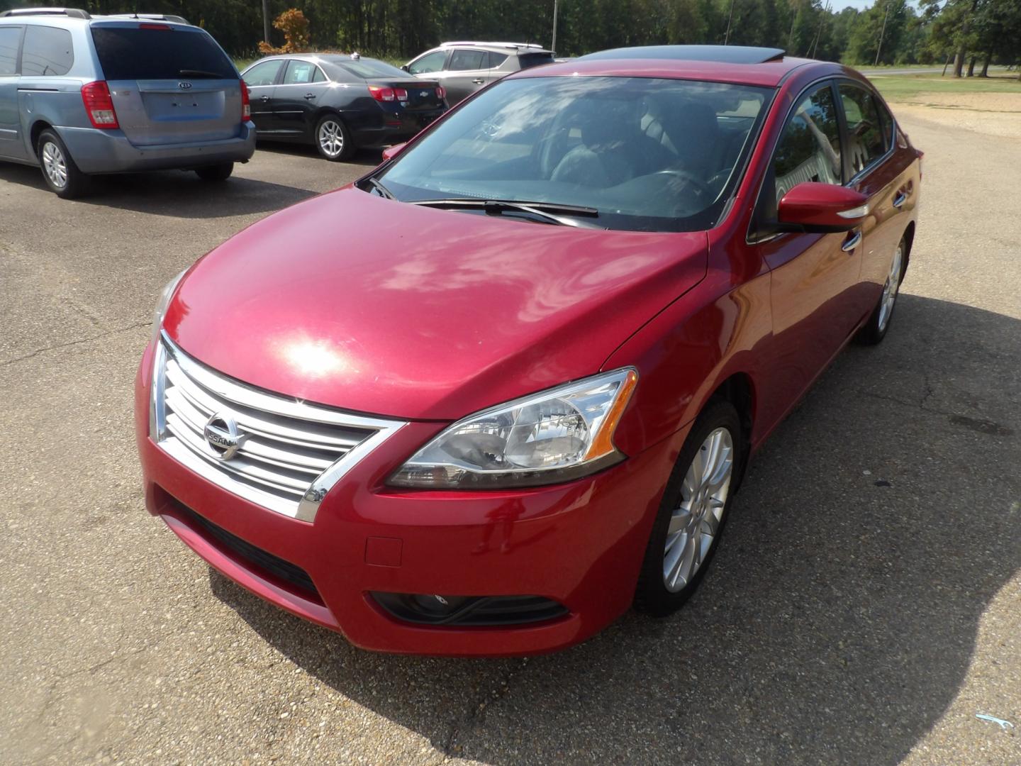 2014 Carmine Red Metallic /Black Nissan Sentra S 6MT (3N1AB7AP5EL) with an 1.8L L4 SFI DOHC 16V engine, 6-Speed Automatic transmission, located at 401 First NE, Bearden, AR, 71720, (870) 687-3414, 33.726528, -92.611519 - Photo#0