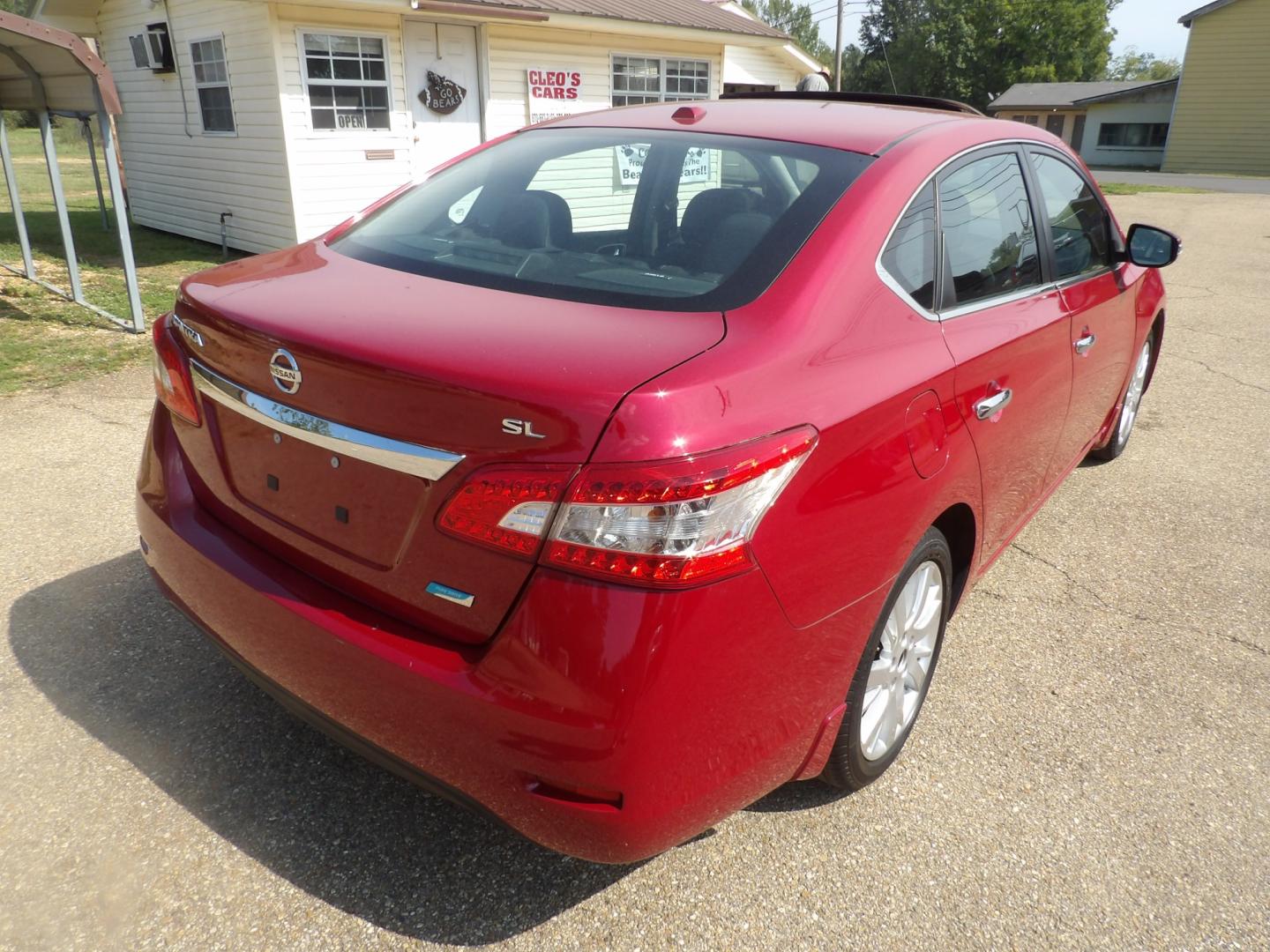 2014 Carmine Red Metallic /Black Nissan Sentra S 6MT (3N1AB7AP5EL) with an 1.8L L4 SFI DOHC 16V engine, 6-Speed Automatic transmission, located at 401 First NE, Bearden, AR, 71720, (870) 687-3414, 33.726528, -92.611519 - Photo#20