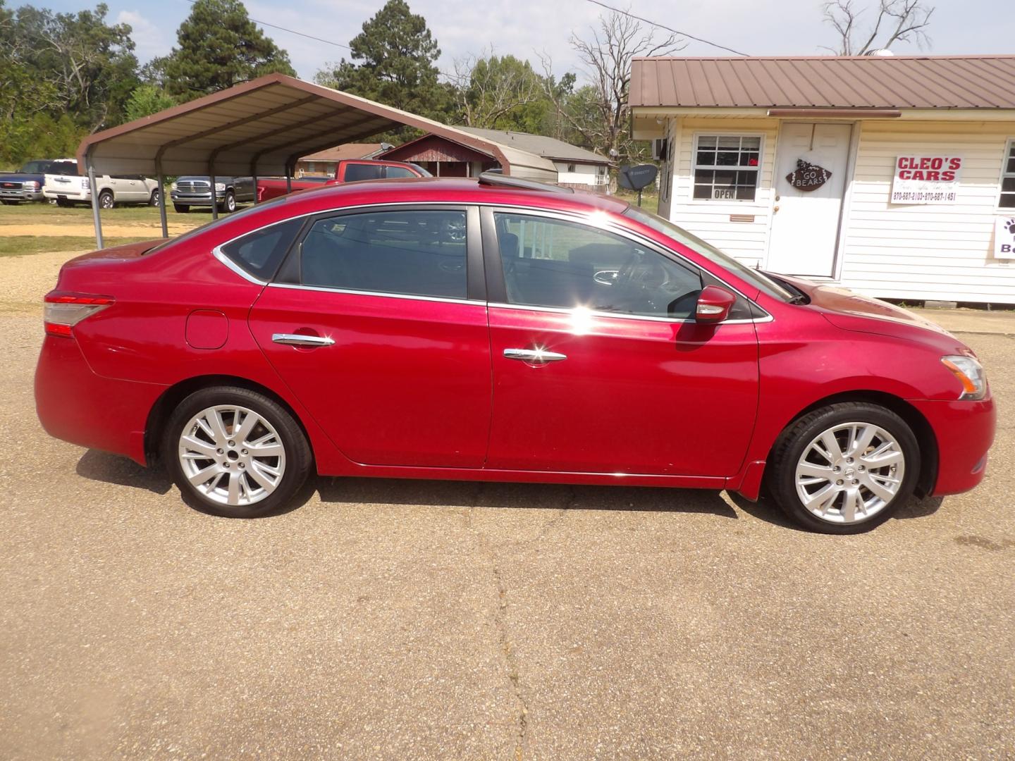 2014 Carmine Red Metallic /Black Nissan Sentra S 6MT (3N1AB7AP5EL) with an 1.8L L4 SFI DOHC 16V engine, 6-Speed Automatic transmission, located at 401 First NE, Bearden, AR, 71720, (870) 687-3414, 33.726528, -92.611519 - Photo#21