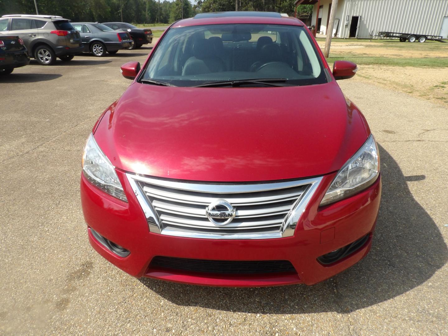 2014 Carmine Red Metallic /Black Nissan Sentra S 6MT (3N1AB7AP5EL) with an 1.8L L4 SFI DOHC 16V engine, 6-Speed Automatic transmission, located at 401 First NE, Bearden, AR, 71720, (870) 687-3414, 33.726528, -92.611519 - Photo#22