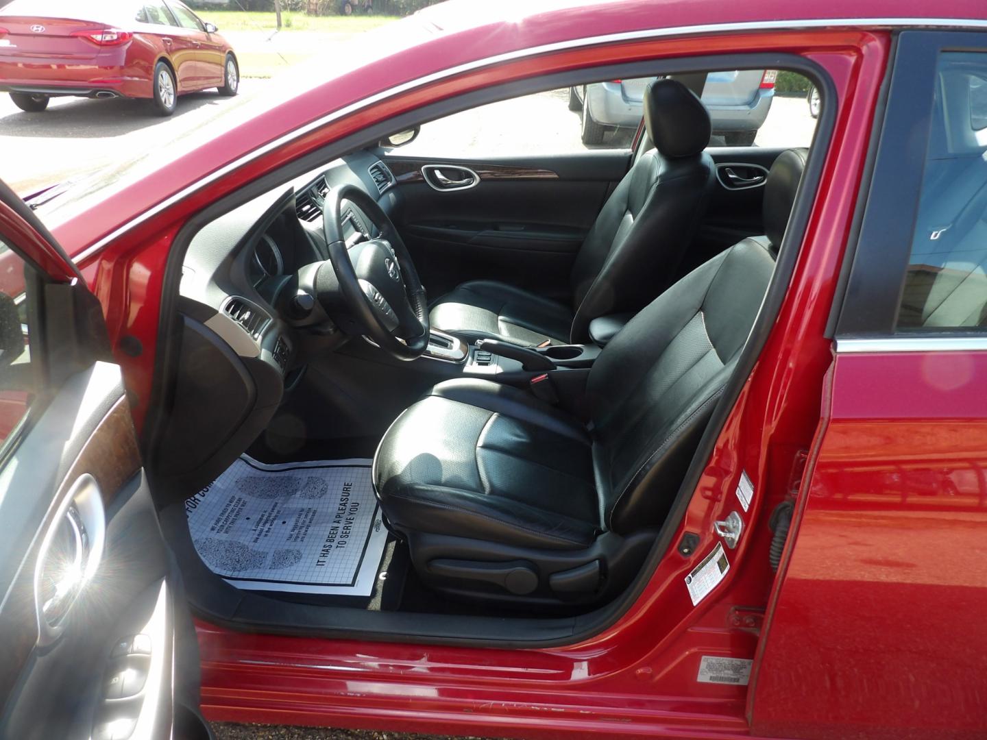 2014 Carmine Red Metallic /Black Nissan Sentra S 6MT (3N1AB7AP5EL) with an 1.8L L4 SFI DOHC 16V engine, 6-Speed Automatic transmission, located at 401 First NE, Bearden, AR, 71720, (870) 687-3414, 33.726528, -92.611519 - Photo#7