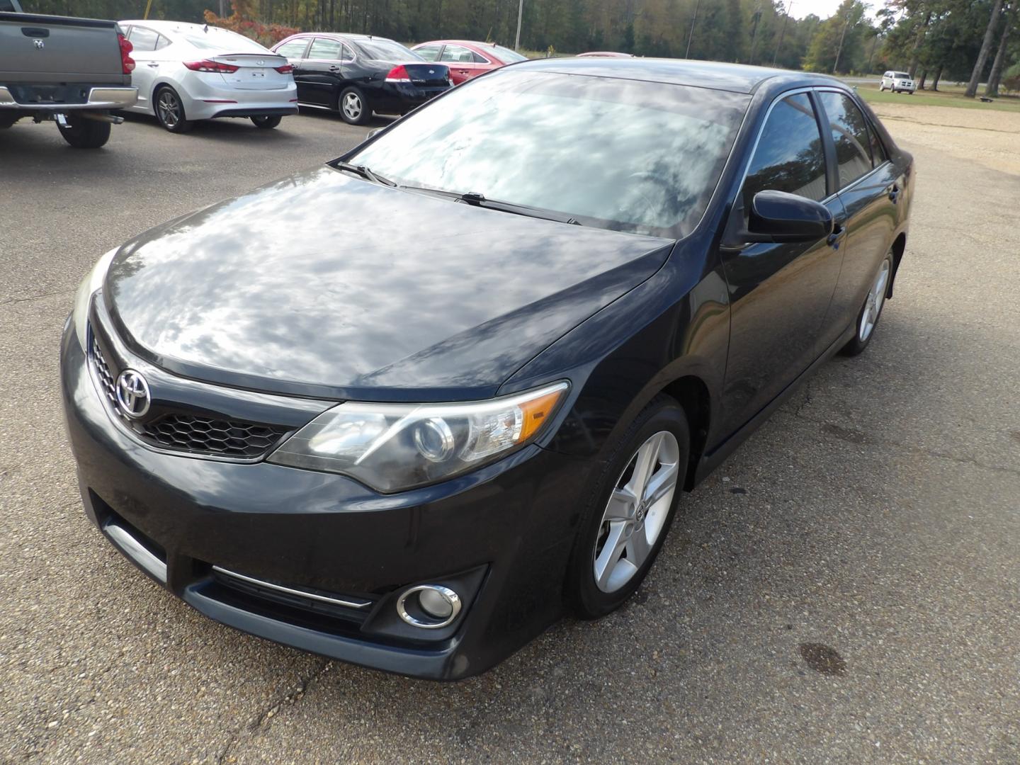 2014 Black /Black Toyota Camry SE (4T1BF1FK4EU) with an 2.5L L4 DOHC 16V engine, 6-Speed Automatic transmission, located at 401 First NE, Bearden, AR, 71720, (870) 687-3414, 33.726528, -92.611519 - Photo#0