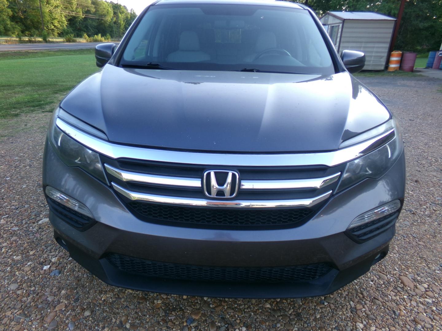 2016 Modern Steel Metallic /Gray Honda Pilot EX-L (5FNYF6H76GB) with an 3.5L V6 engine, automatic transmission, located at 401 First NE, Bearden, AR, 71720, (870) 687-3414, 33.726528, -92.611519 - Photo#27