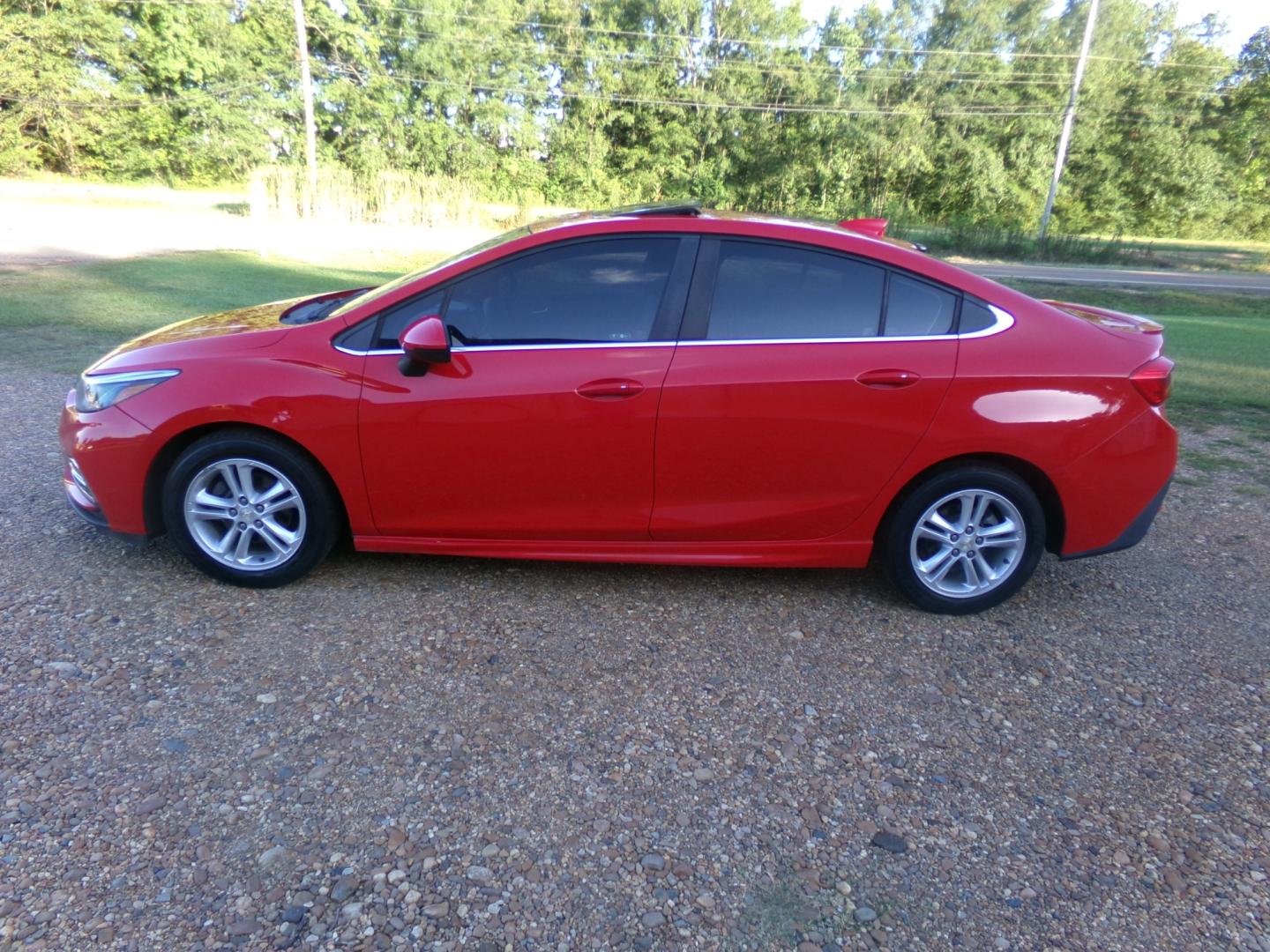 2016 Torch Red /Black Chevrolet Cruze LT (1G1BE5SM3G7) with an 1.4L Ecotec engine, automatic transmission, located at 401 First NE, Bearden, AR, 71720, (870) 687-3414, 33.726528, -92.611519 - Photo#1