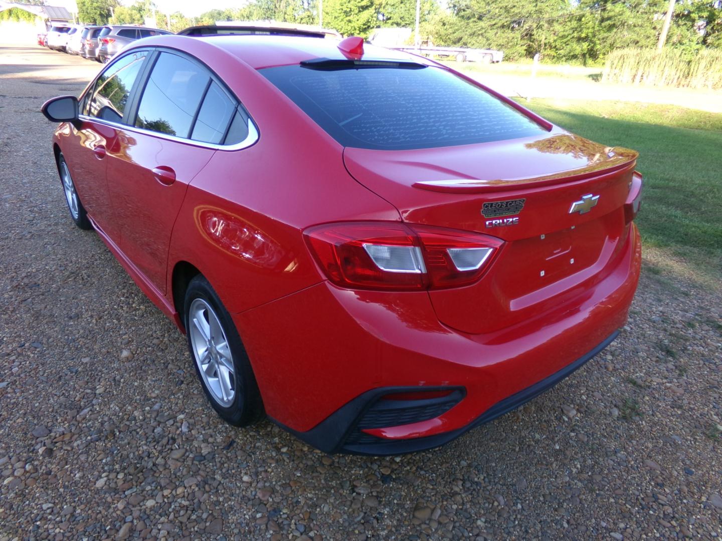 2016 Torch Red /Black Chevrolet Cruze LT (1G1BE5SM3G7) with an 1.4L Ecotec engine, automatic transmission, located at 401 First NE, Bearden, AR, 71720, (870) 687-3414, 33.726528, -92.611519 - Photo#2