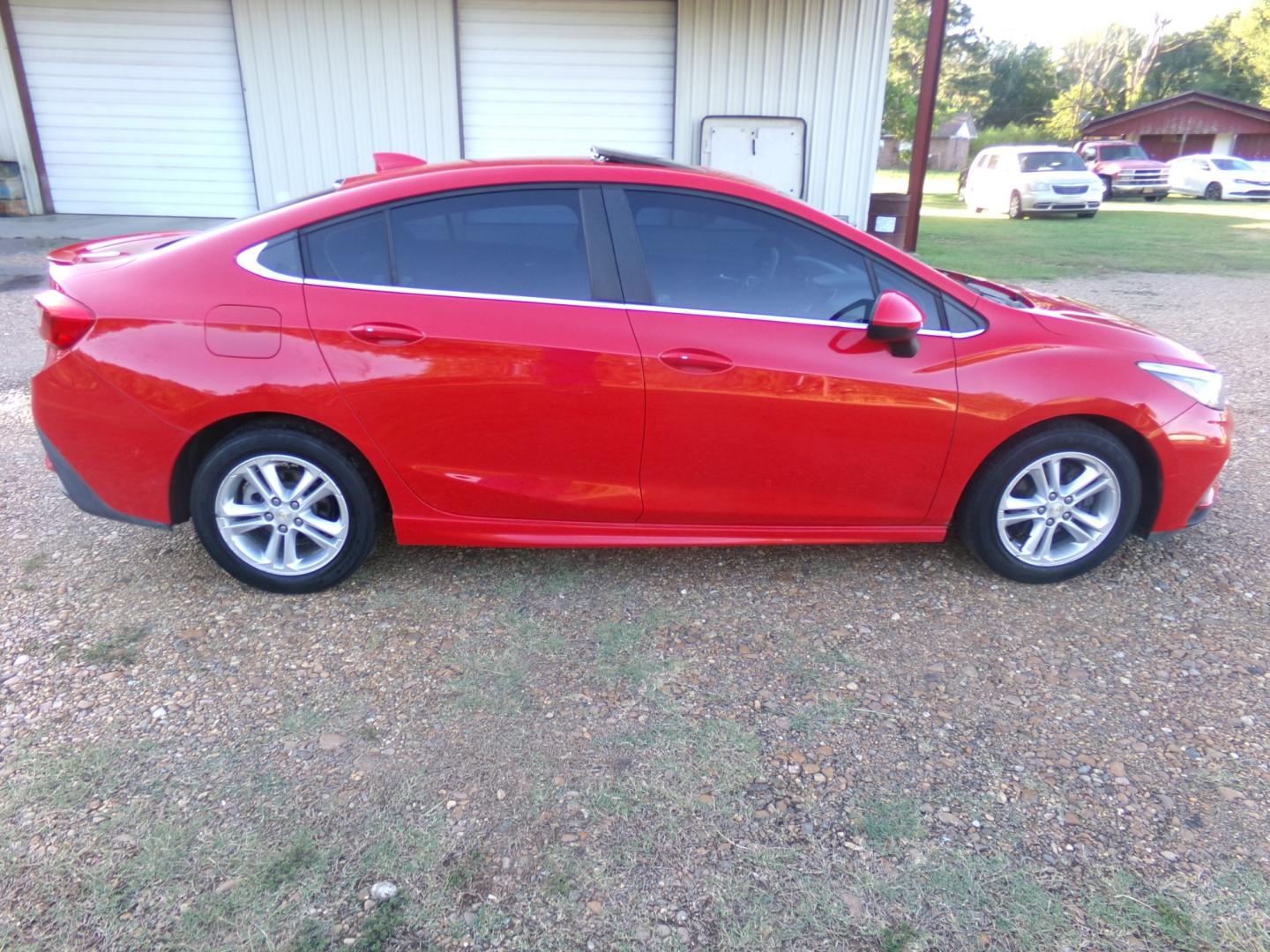 2016 Torch Red /Black Chevrolet Cruze LT (1G1BE5SM3G7) with an 1.4L Ecotec engine, automatic transmission, located at 401 First NE, Bearden, AR, 71720, (870) 687-3414, 33.726528, -92.611519 - Photo#23