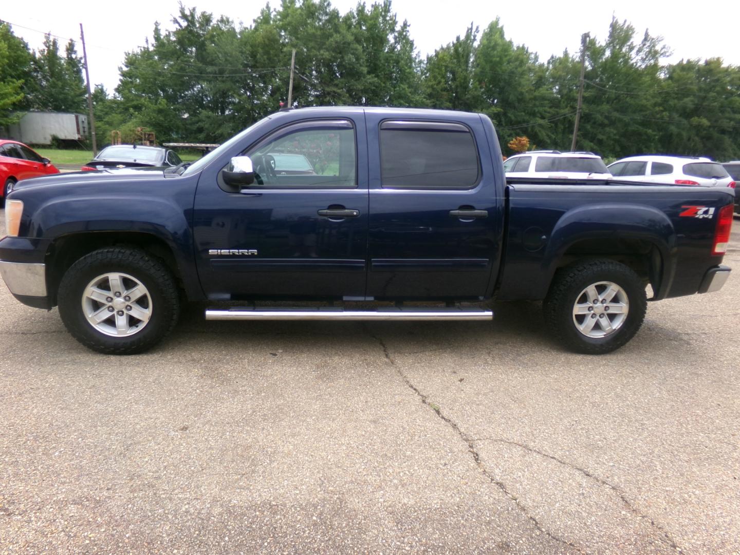 2012 Luxo Blue Metallic /Tan GMC Sierra 1500 SLE (3GTP2VE70CG) with an 5.3L V8 engine, Automatic transmission, located at 401 First NE, Bearden, AR, 71720, (870) 687-3414, 33.726528, -92.611519 - Photo#1