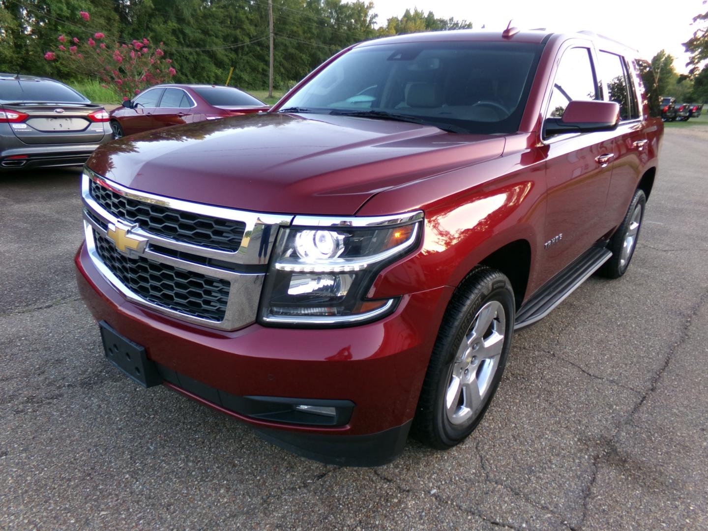 2016 Crystal Claret Tincoat /Tan Chevrolet Tahoe LT (1GNSKBKC9GR) with an 5.3L V8 engine, Automatic transmission, located at 401 First NE, Bearden, AR, 71720, (870) 687-3414, 33.726528, -92.611519 - Photo#0