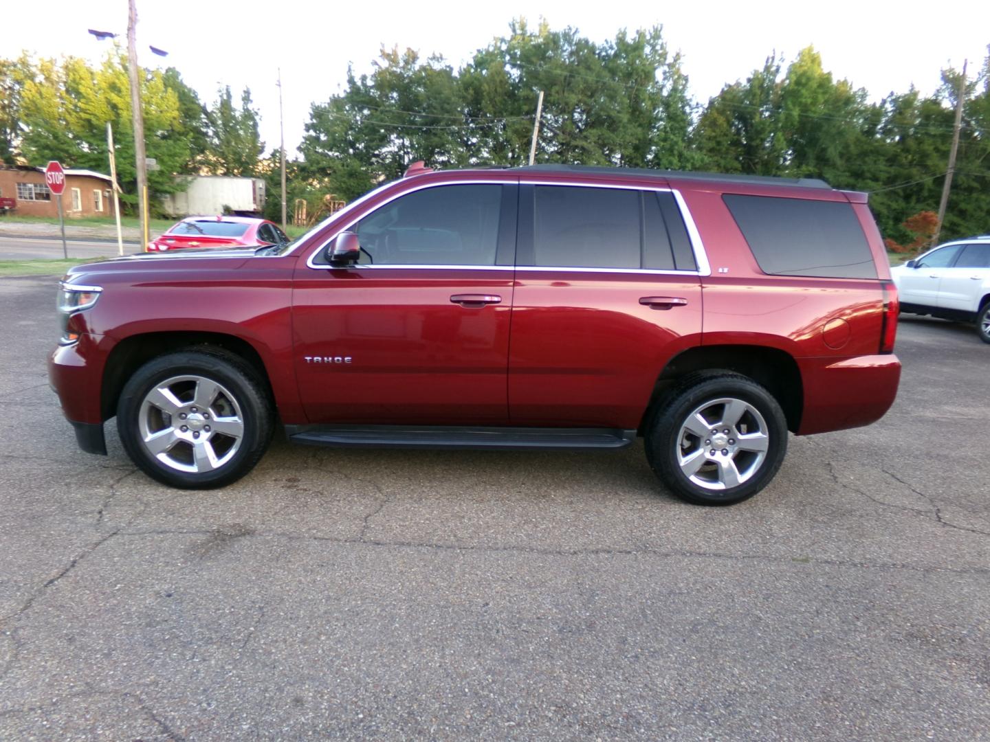 2016 Crystal Claret Tincoat /Tan Chevrolet Tahoe LT (1GNSKBKC9GR) with an 5.3L V8 engine, Automatic transmission, located at 401 First NE, Bearden, AR, 71720, (870) 687-3414, 33.726528, -92.611519 - Photo#1