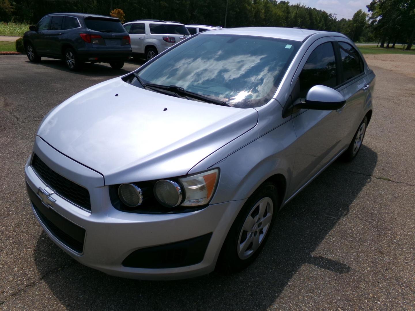 2015 /Gray Chevrolet Sonic LS Auto Sedan (1G1JA5SHXF4) with an 1.8L L4 DOHC 24V engine, 6-Speed Automatic transmission, located at 401 First NE, Bearden, AR, 71720, (870) 687-3414, 33.726528, -92.611519 - Photo#0