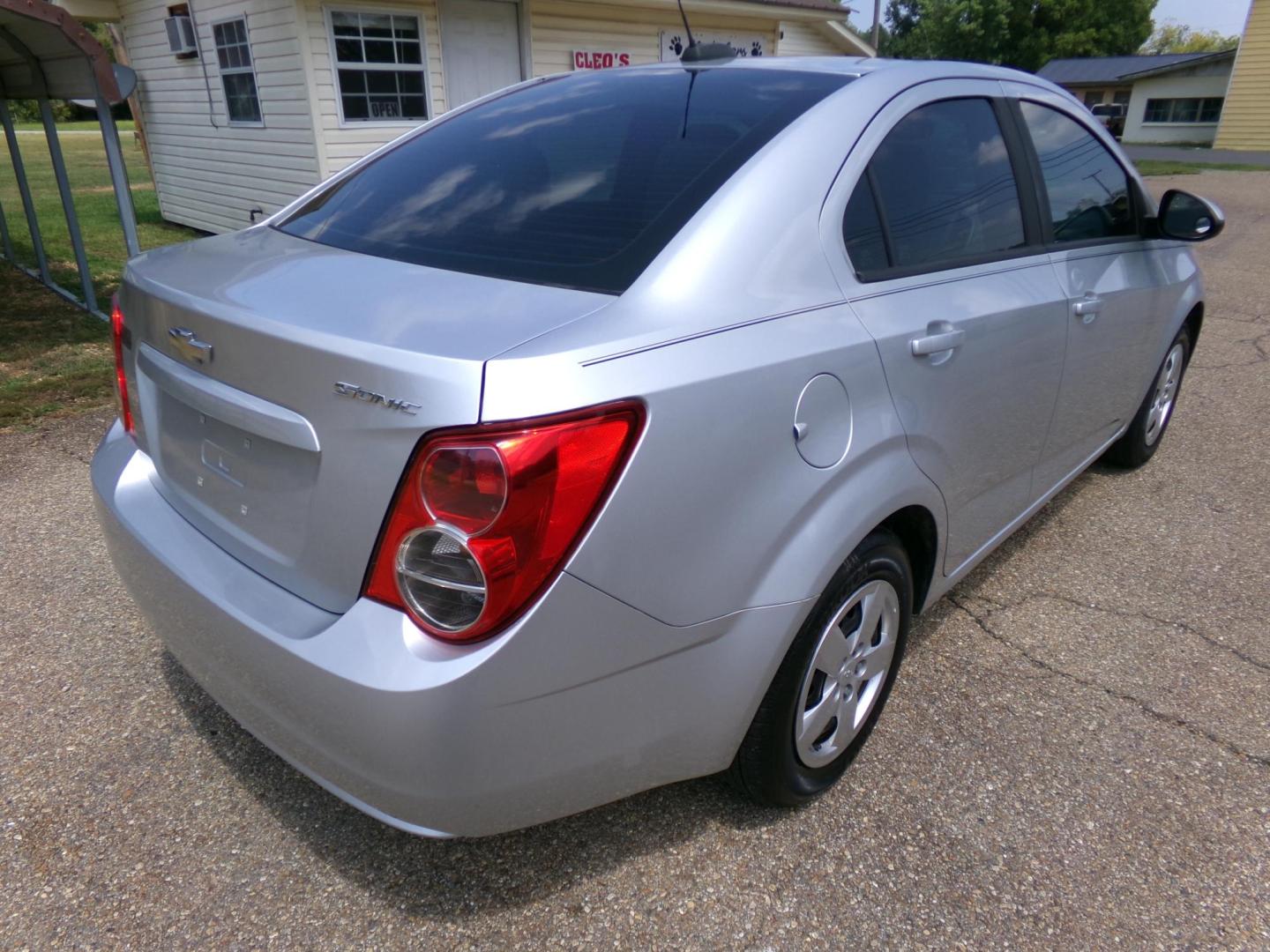 2015 /Gray Chevrolet Sonic LS Auto Sedan (1G1JA5SHXF4) with an 1.8L L4 DOHC 24V engine, 6-Speed Automatic transmission, located at 401 First NE, Bearden, AR, 71720, (870) 687-3414, 33.726528, -92.611519 - Photo#15