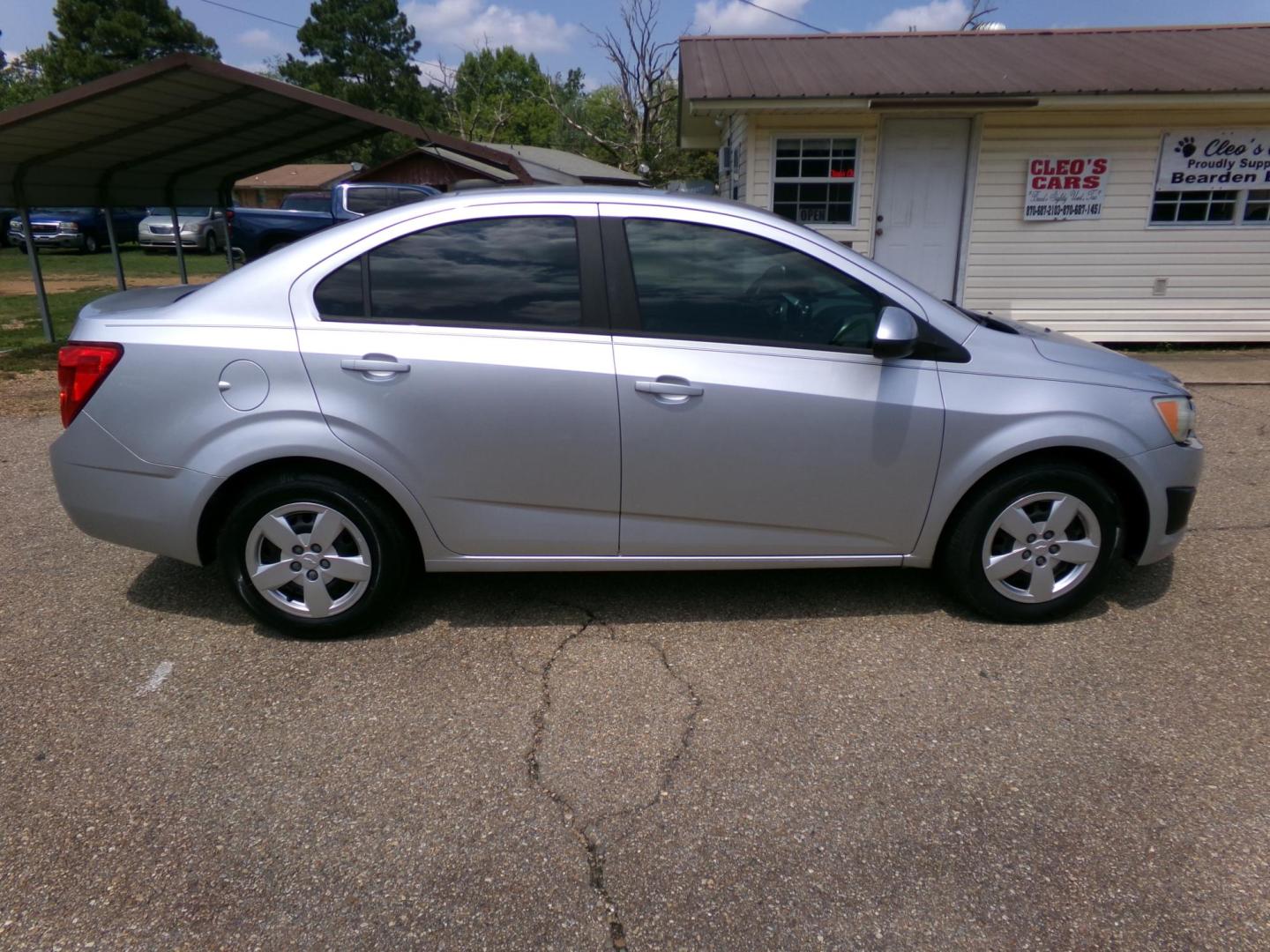 2015 /Gray Chevrolet Sonic LS Auto Sedan (1G1JA5SHXF4) with an 1.8L L4 DOHC 24V engine, 6-Speed Automatic transmission, located at 401 First NE, Bearden, AR, 71720, (870) 687-3414, 33.726528, -92.611519 - Photo#16