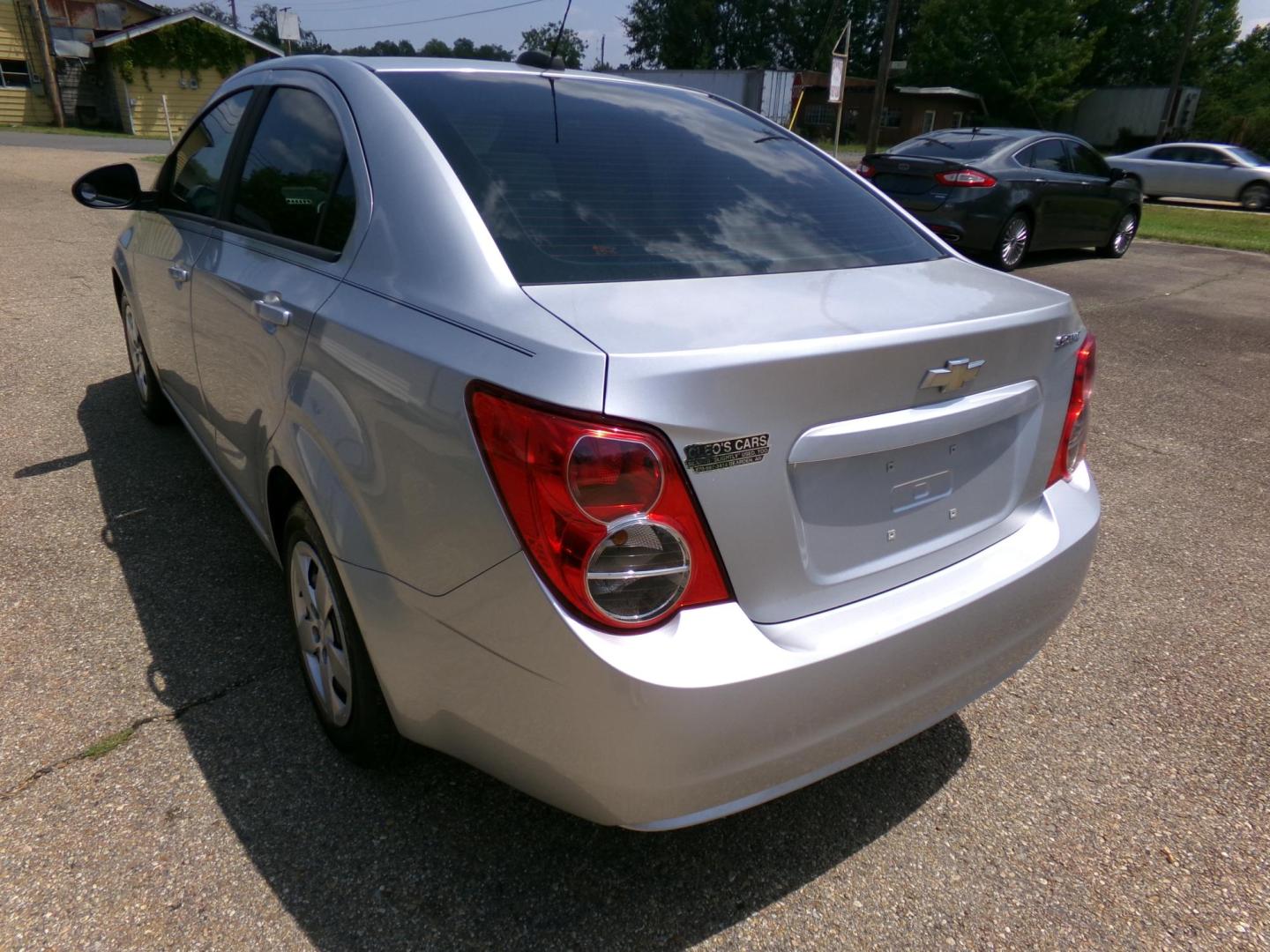 2015 /Gray Chevrolet Sonic LS Auto Sedan (1G1JA5SHXF4) with an 1.8L L4 DOHC 24V engine, 6-Speed Automatic transmission, located at 401 First NE, Bearden, AR, 71720, (870) 687-3414, 33.726528, -92.611519 - Photo#2