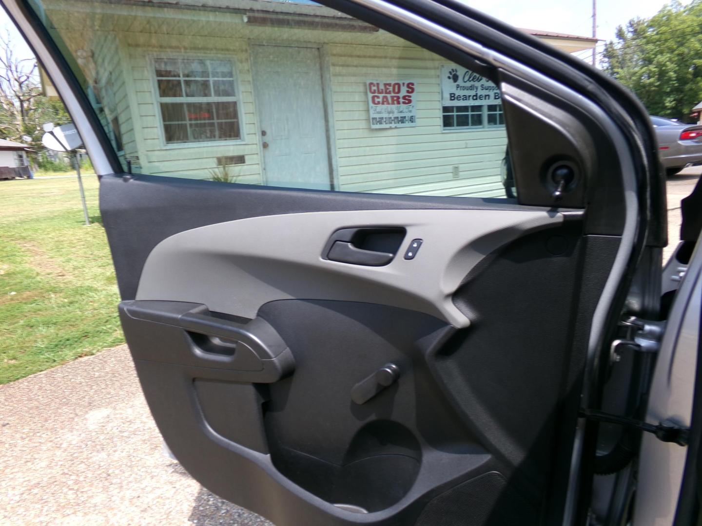 2015 /Gray Chevrolet Sonic LS Auto Sedan (1G1JA5SHXF4) with an 1.8L L4 DOHC 24V engine, 6-Speed Automatic transmission, located at 401 First NE, Bearden, AR, 71720, (870) 687-3414, 33.726528, -92.611519 - Photo#4