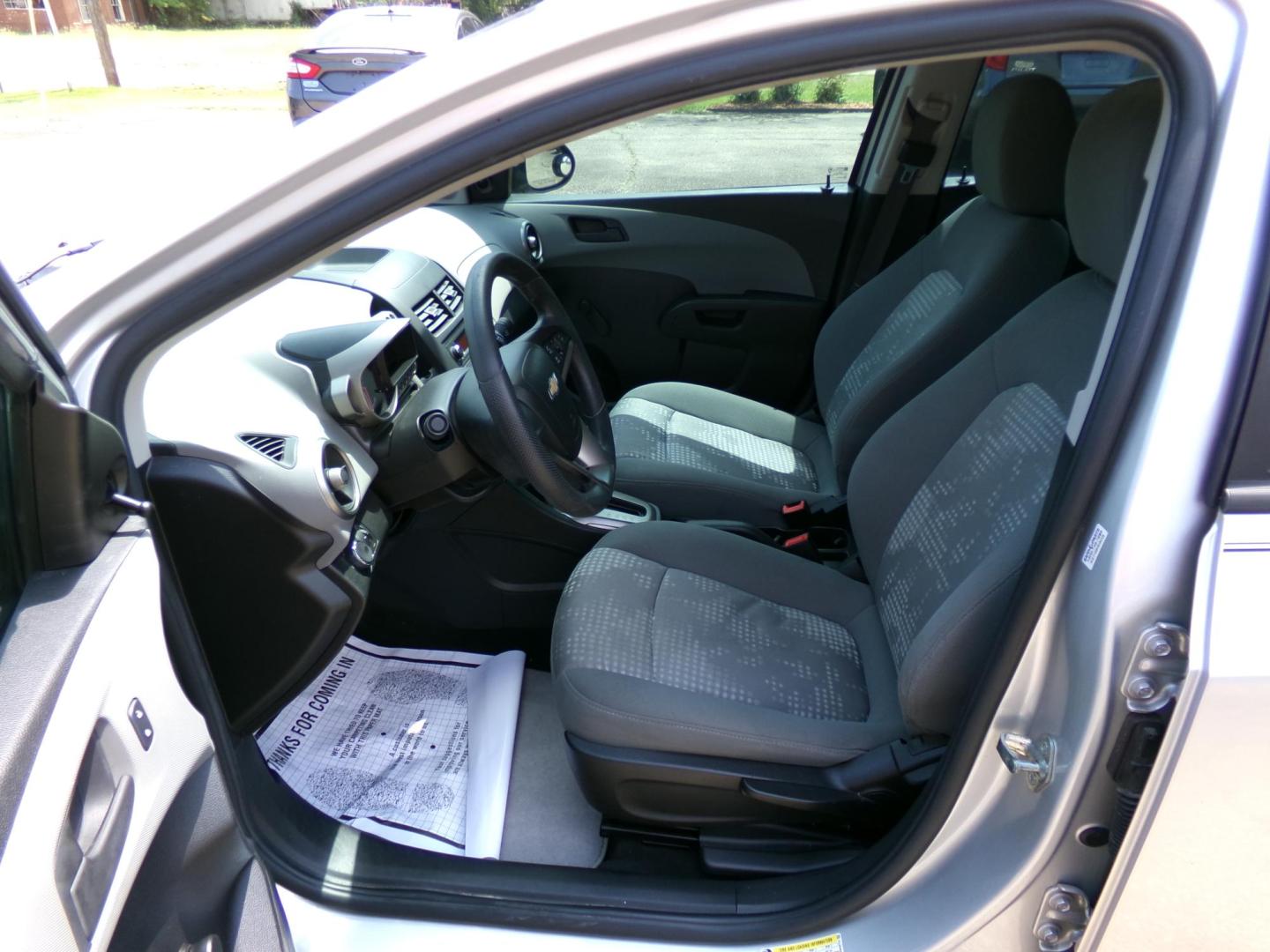 2015 /Gray Chevrolet Sonic LS Auto Sedan (1G1JA5SHXF4) with an 1.8L L4 DOHC 24V engine, 6-Speed Automatic transmission, located at 401 First NE, Bearden, AR, 71720, (870) 687-3414, 33.726528, -92.611519 - Photo#5