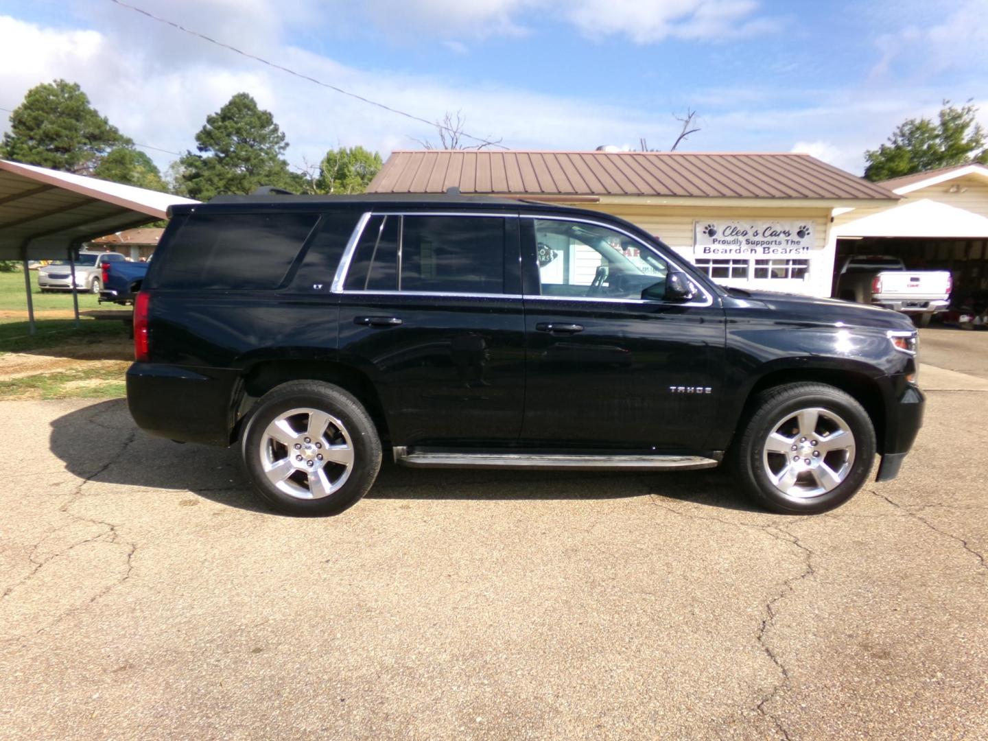 2015 Black /Black Chevrolet Tahoe LT 4WD (1GNSKBKCXFR) with an 5.3L V8 OHV 16V engine, 6-Speed Automatic transmission, located at 401 First NE, Bearden, AR, 71720, (870) 687-3414, 33.726528, -92.611519 - CARFAX-CERTIFIED ONE OWNER! - Photo#31