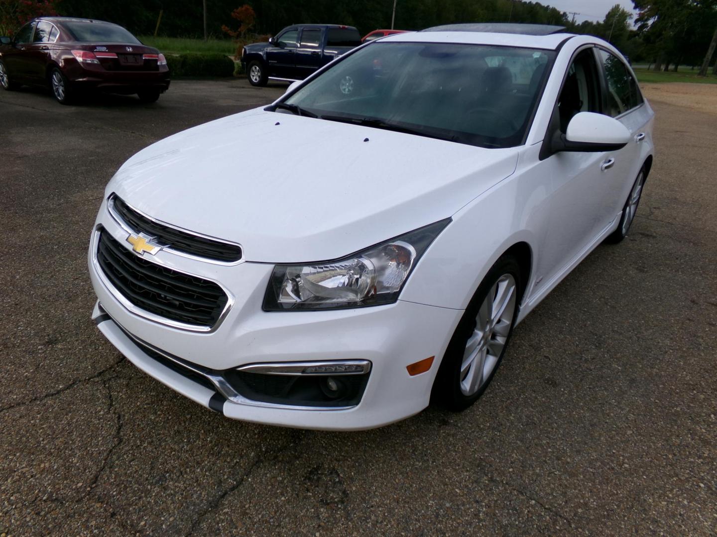 2015 Olympic White /Black Chevrolet Cruze LTZ Auto (1G1PG5SB2F7) with an 1.4L L4 DOHC 16V TURBO engine, 6-Speed Automatic transmission, located at 401 First NE, Bearden, AR, 71720, (870) 687-3414, 33.726528, -92.611519 - Photo#0