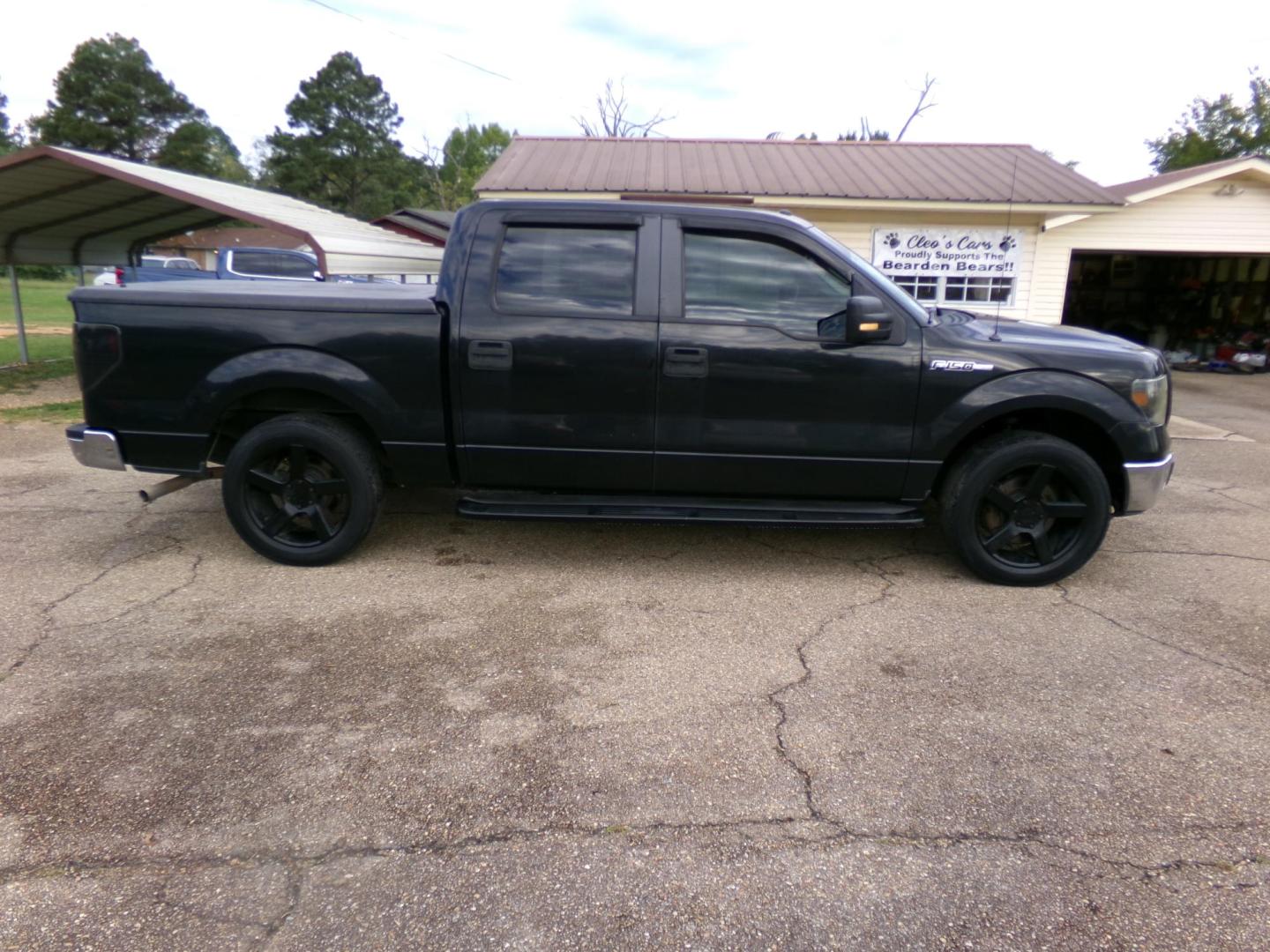 2010 Black /Tan Ford F-150 XLT SuperCrew 5.5-ft. Bed 2WD (1FTEW1C82AK) with an 4.6L V8 SOHC 24V engine, 4-Speed Automatic transmission, located at 401 First NE, Bearden, AR, 71720, (870) 687-3414, 33.726528, -92.611519 - Photo#19