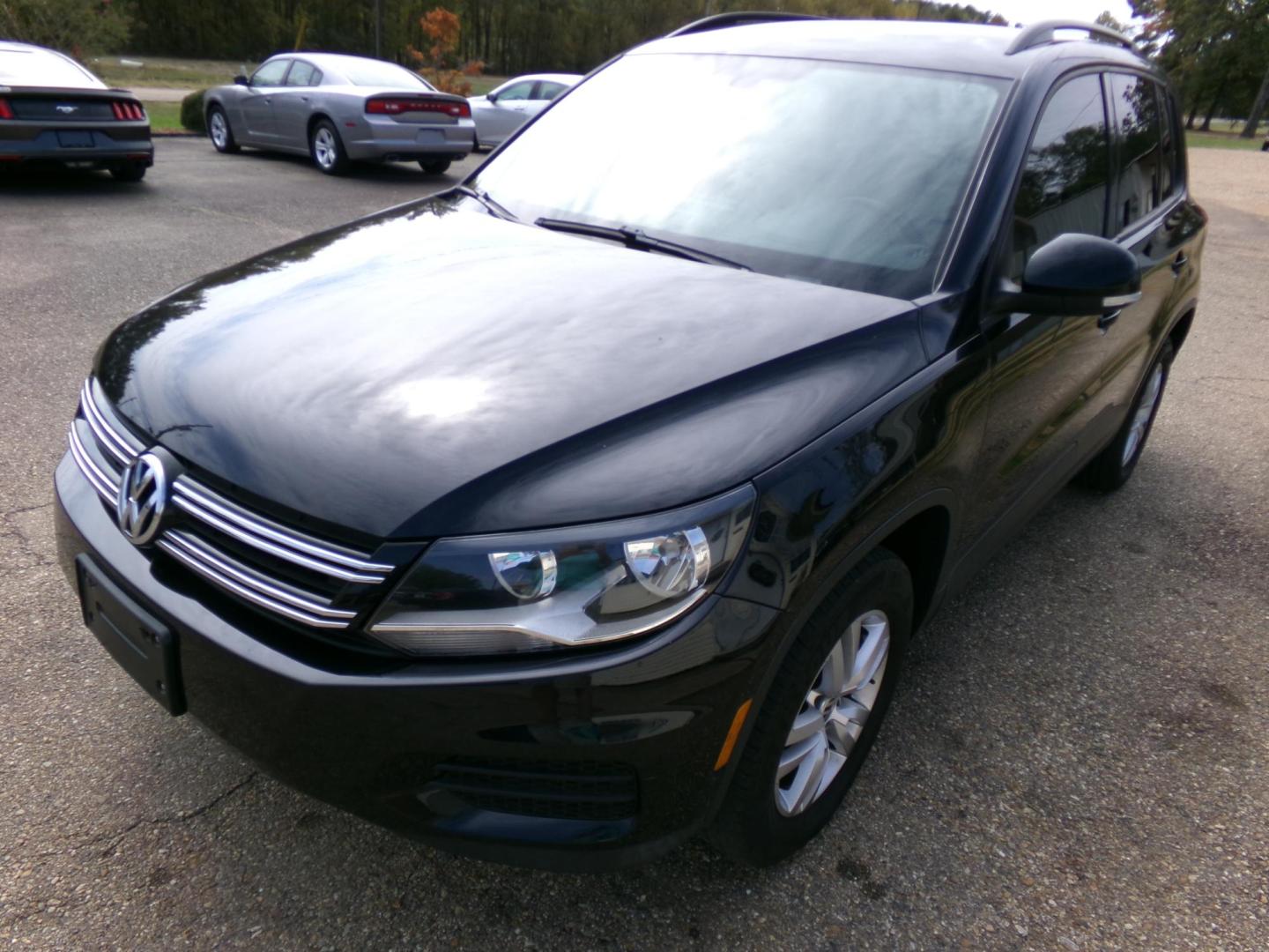 2017 Black /Tan Volkswagen Tiguan SE 4Motion (WVGBV7AX9HK) with an 2.0L L4 DOHC 16V TURBO engine, 6A transmission, located at 401 First NE, Bearden, AR, 71720, (870) 687-3414, 33.726528, -92.611519 - Photo#0