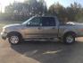 2003 Gold /Tan Ford F-150 XLT SuperCrew 2WD (1FTRW07613K) with an 4.6L V8 SOHC 16V engine, 4-Speed Automatic Overdrive transmission, located at 401 First NE, Bearden, AR, 71720, (870) 687-3414, 33.726528, -92.611519 - Photo#1