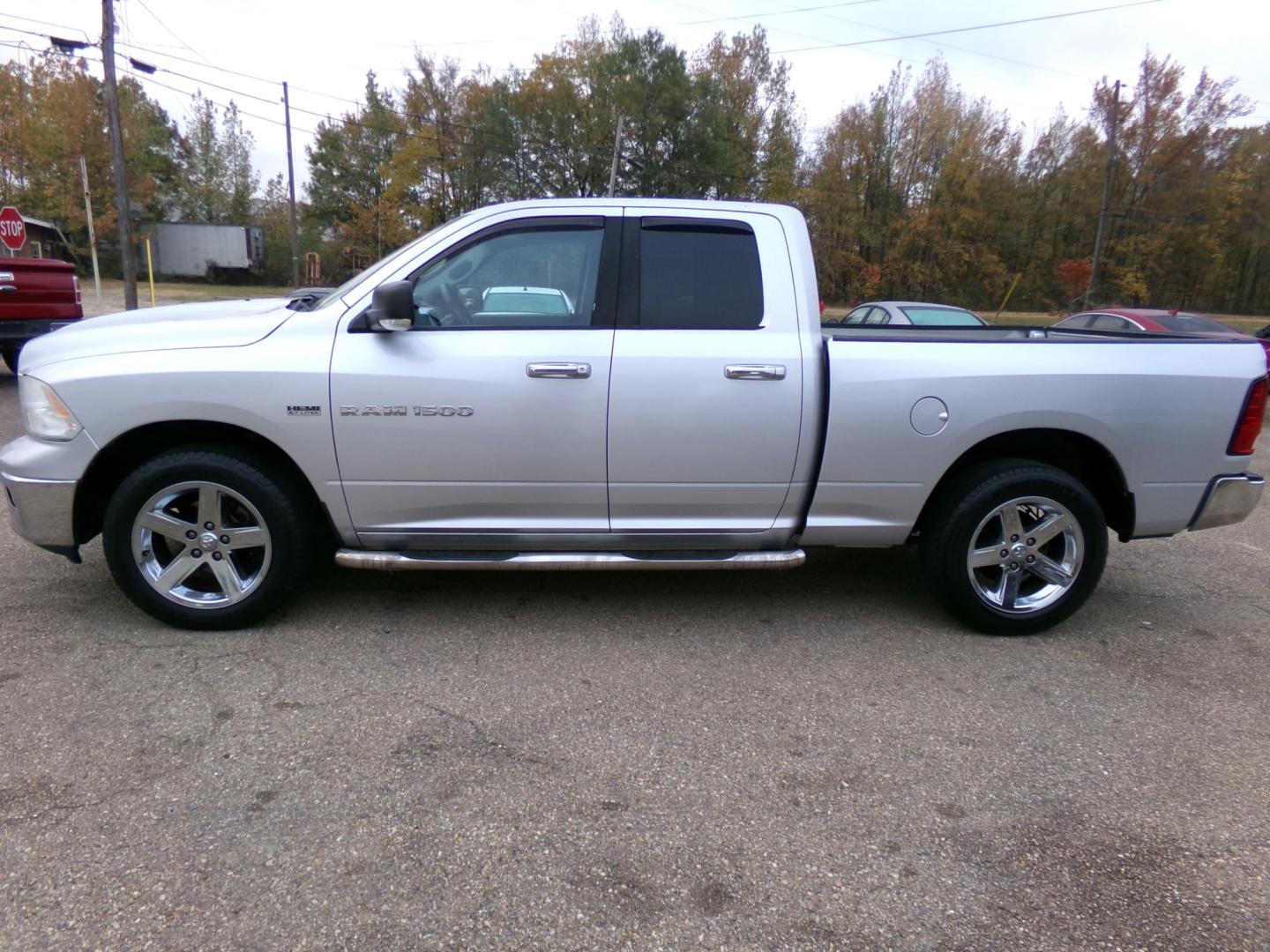 2012 Dodge Ram 1500 SLT Quad Cab 2WD (1C6RD6GT1CS) with an 5.7L V8 OHV 16V engine, 6-Speed Automatic transmission, located at 401 First NE, Bearden, AR, 71720, (870) 687-3414, 33.726528, -92.611519 - Photo#1