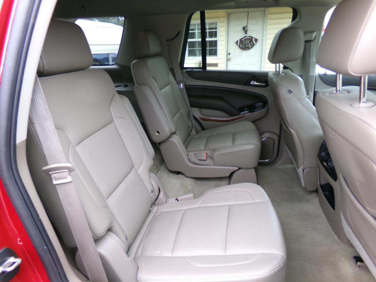 2015 Crystal Red Tintcoat /Tan Chevrolet Tahoe LTZ 4WD (1GNSKCKC1FR) with an 5.3L V8 OHV 16V engine, 6-Speed Automatic transmission, located at 401 First NE, Bearden, AR, 71720, (870) 687-3414, 33.726528, -92.611519 - Photo#19