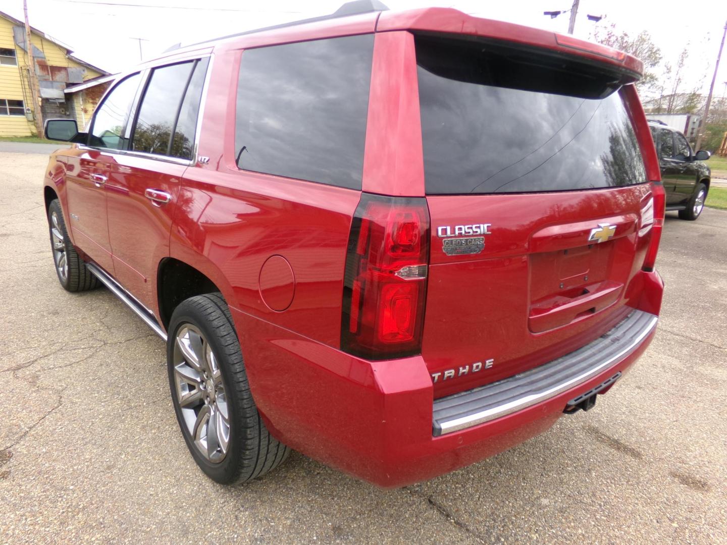 2015 Crystal Red Tintcoat /Tan Chevrolet Tahoe LTZ 4WD (1GNSKCKC1FR) with an 5.3L V8 OHV 16V engine, 6-Speed Automatic transmission, located at 401 First NE, Bearden, AR, 71720, (870) 687-3414, 33.726528, -92.611519 - Photo#2