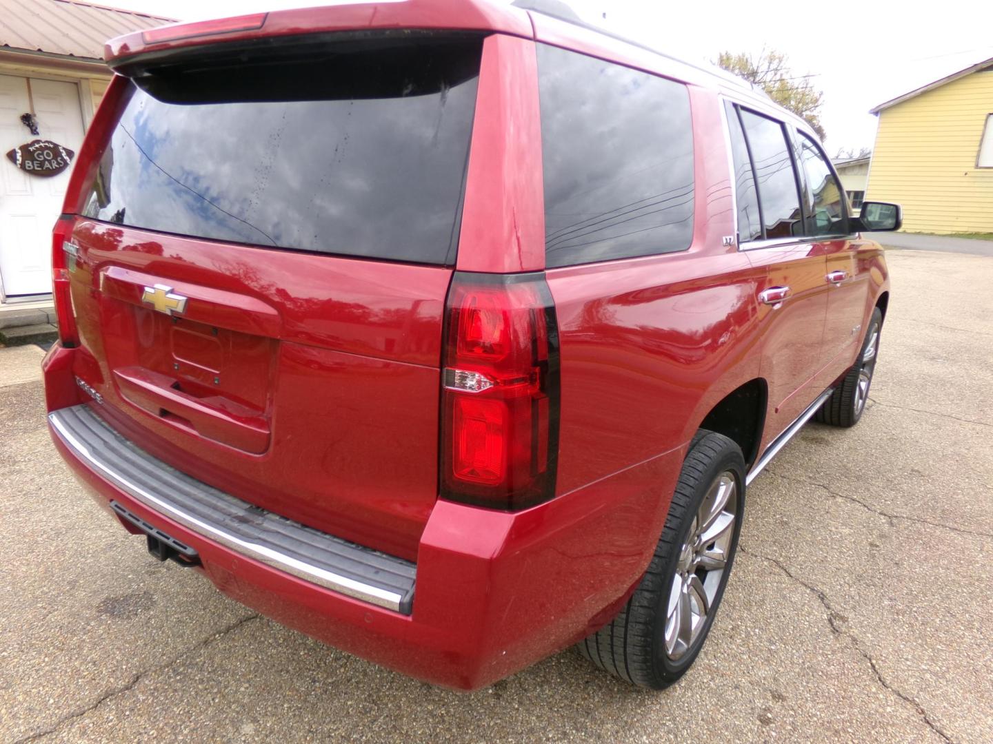 2015 Crystal Red Tintcoat /Tan Chevrolet Tahoe LTZ 4WD (1GNSKCKC1FR) with an 5.3L V8 OHV 16V engine, 6-Speed Automatic transmission, located at 401 First NE, Bearden, AR, 71720, (870) 687-3414, 33.726528, -92.611519 - Photo#25