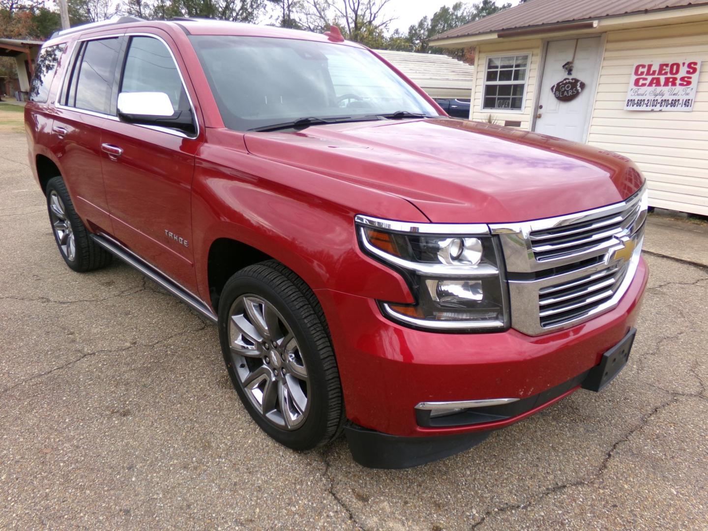 2015 Crystal Red Tintcoat /Tan Chevrolet Tahoe LTZ 4WD (1GNSKCKC1FR) with an 5.3L V8 OHV 16V engine, 6-Speed Automatic transmission, located at 401 First NE, Bearden, AR, 71720, (870) 687-3414, 33.726528, -92.611519 - Photo#28