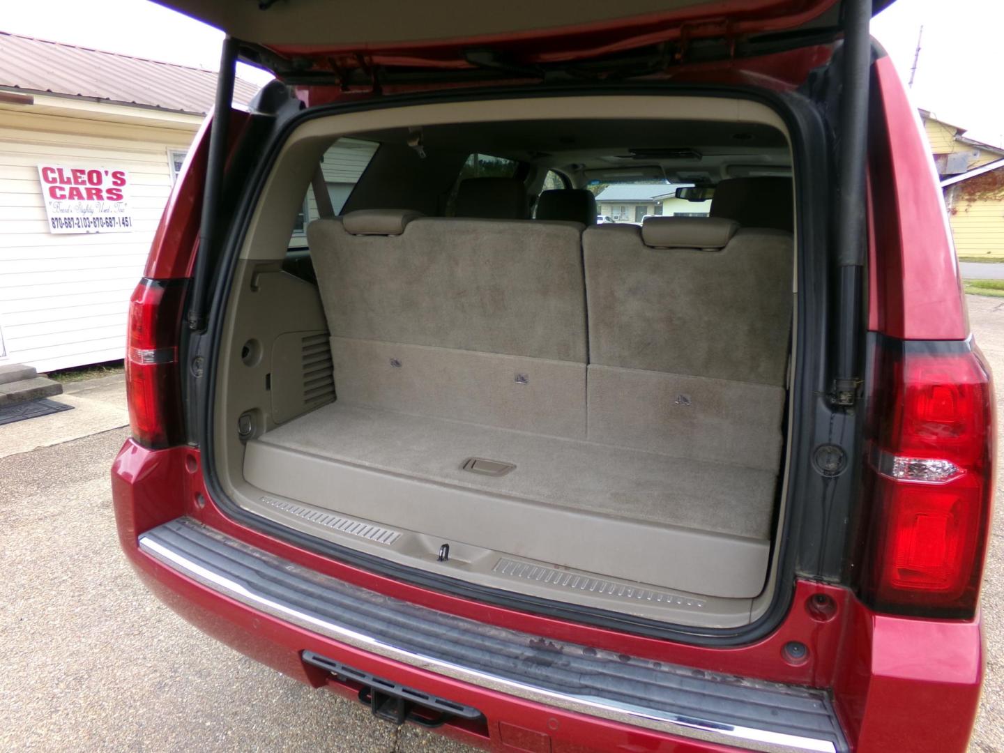 2015 Crystal Red Tintcoat /Tan Chevrolet Tahoe LTZ 4WD (1GNSKCKC1FR) with an 5.3L V8 OHV 16V engine, 6-Speed Automatic transmission, located at 401 First NE, Bearden, AR, 71720, (870) 687-3414, 33.726528, -92.611519 - Photo#3