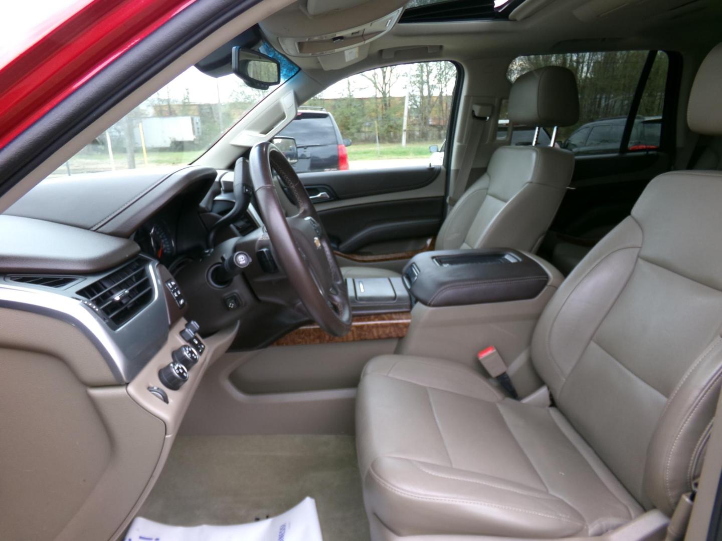 2015 Crystal Red Tintcoat /Tan Chevrolet Tahoe LTZ 4WD (1GNSKCKC1FR) with an 5.3L V8 OHV 16V engine, 6-Speed Automatic transmission, located at 401 First NE, Bearden, AR, 71720, (870) 687-3414, 33.726528, -92.611519 - Photo#9