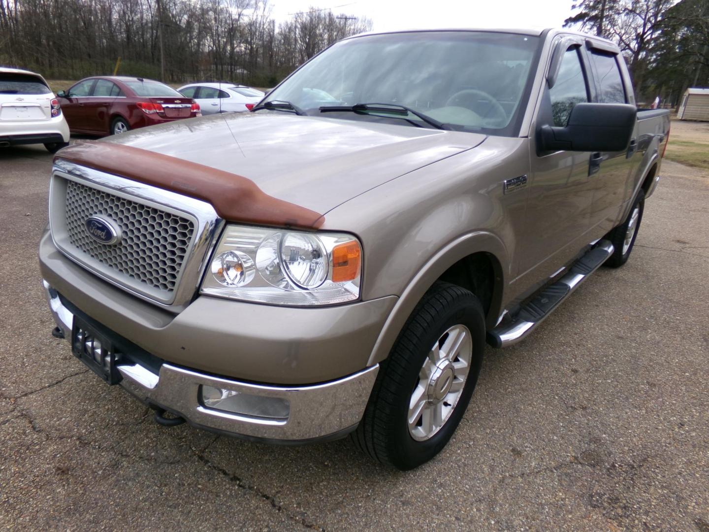 2004 Arizona Beige Metallic /Cream Ford F-150 Lariat SuperCrew 4WD (1FTPW14554K) with an 5.4L V6 SOHC 16V engine, 4-Speed Automatic Overdrive transmission, located at 401 First NE, Bearden, AR, 71720, (870) 687-3414, 33.726528, -92.611519 - Photo#0