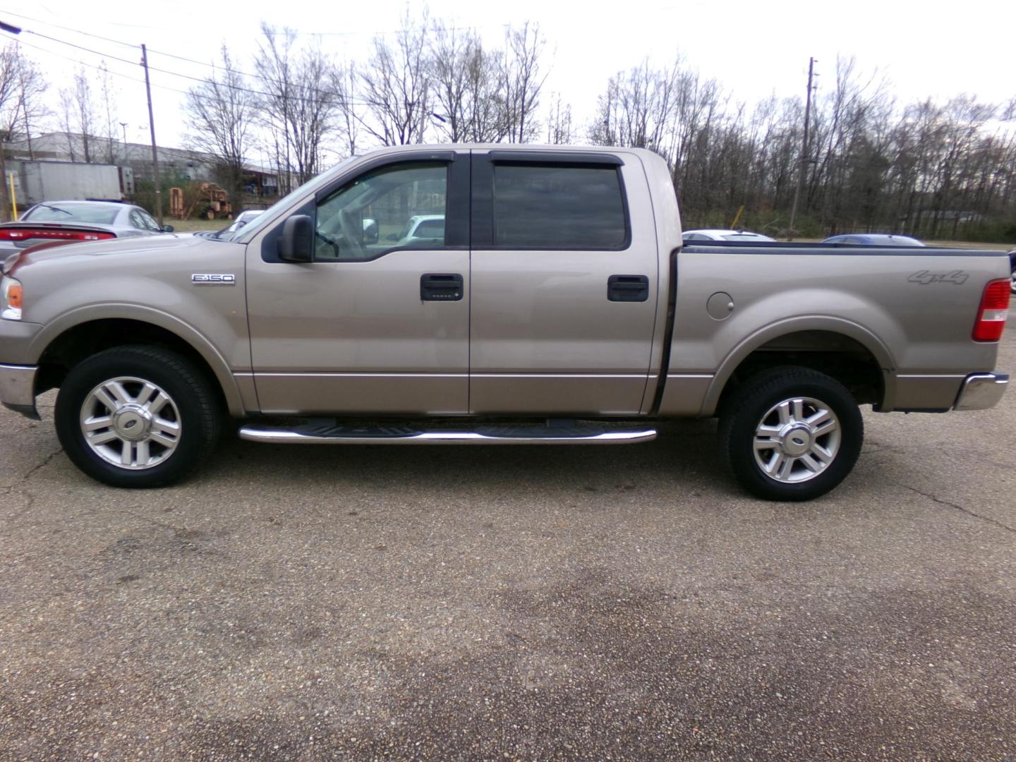 2004 Arizona Beige Metallic /Cream Ford F-150 Lariat SuperCrew 4WD (1FTPW14554K) with an 5.4L V6 SOHC 16V engine, 4-Speed Automatic Overdrive transmission, located at 401 First NE, Bearden, AR, 71720, (870) 687-3414, 33.726528, -92.611519 - Photo#1