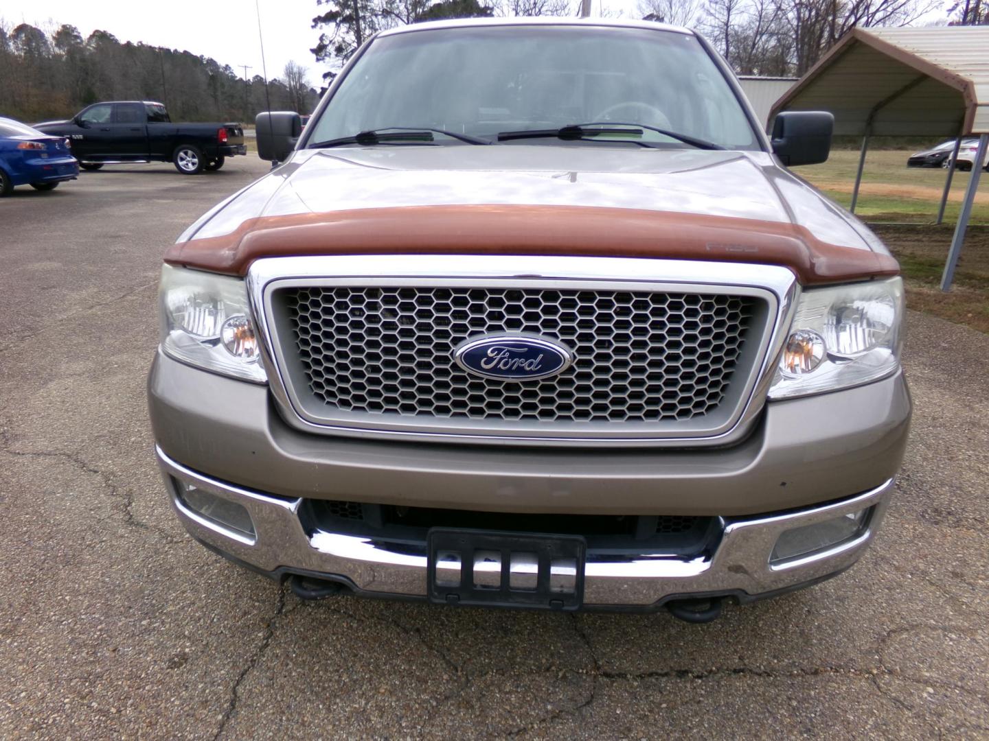 2004 Arizona Beige Metallic /Cream Ford F-150 Lariat SuperCrew 4WD (1FTPW14554K) with an 5.4L V6 SOHC 16V engine, 4-Speed Automatic Overdrive transmission, located at 401 First NE, Bearden, AR, 71720, (870) 687-3414, 33.726528, -92.611519 - Photo#21