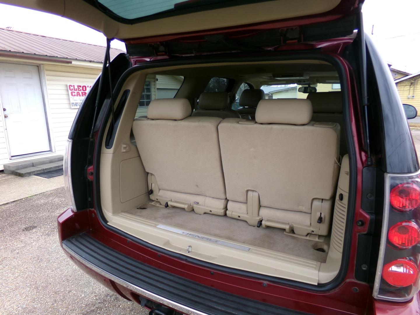 2010 Red Jewel Tintcoat /Tan GMC Yukon Denali 4WD (1GKUKEEF6AR) with an 6.2L V8 OHV 16V engine, 4-Speed Automatic transmission, located at 401 First NE, Bearden, AR, 71720, (870) 687-3414, 33.726528, -92.611519 - Photo#3