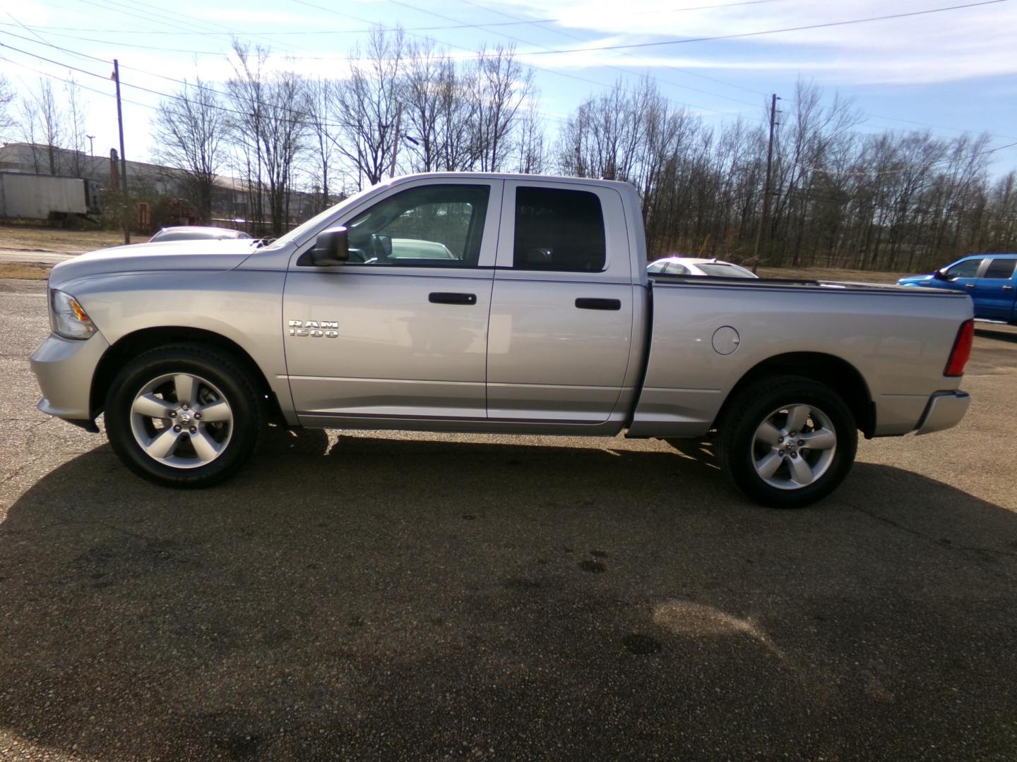 2014 Silver /Gray RAM 1500 Tradesman Quad Cab 2WD (1C6RR6FG9ES) with an 3.6L V6 DOHC 24V FFV engine, 6-Speed Automatic transmission, located at 401 First NE, Bearden, AR, 71720, (870) 687-3414, 33.726528, -92.611519 - Photo#1