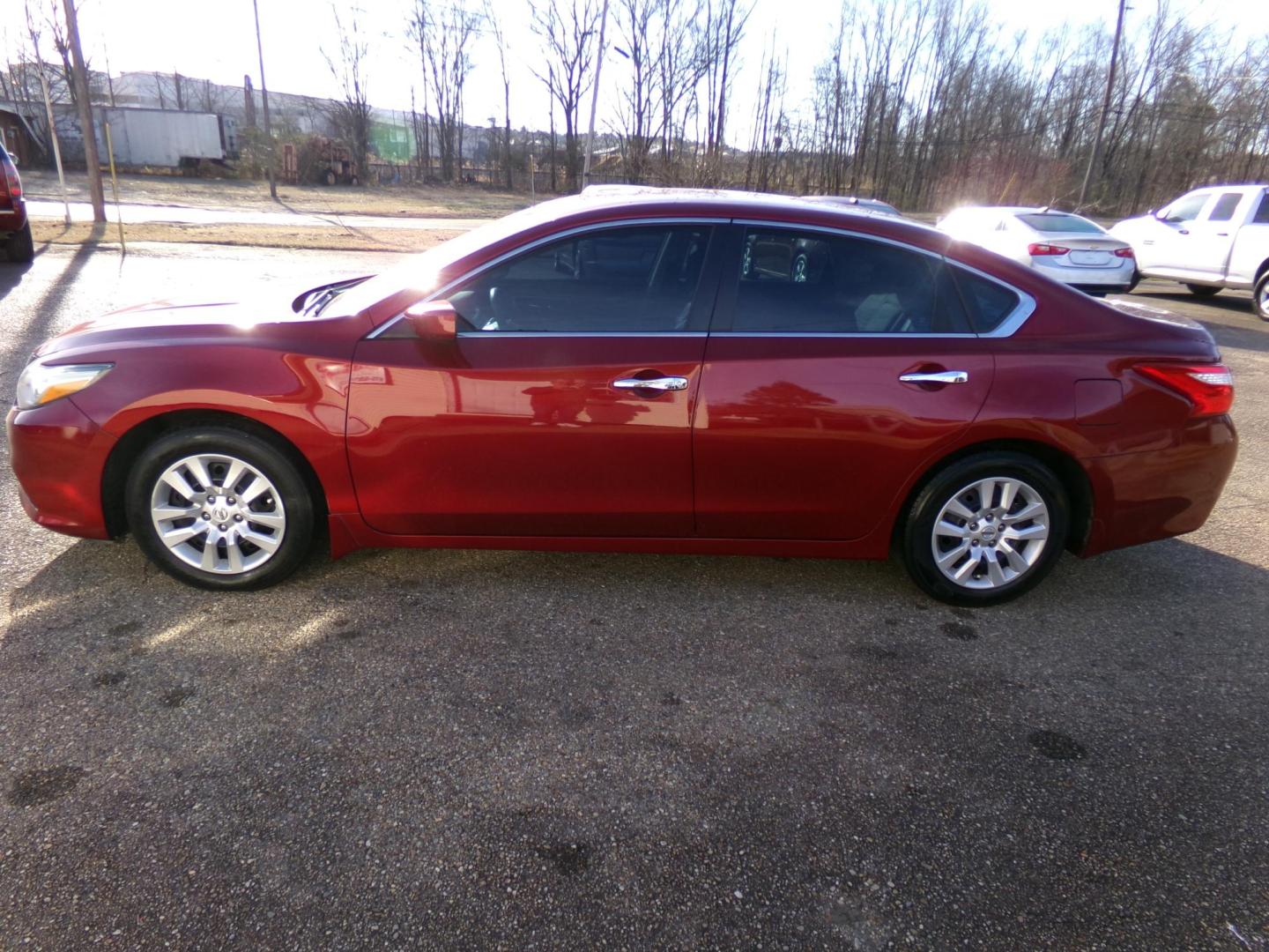 2017 Scarlet Ember Tricoat /Black Nissan Altima 2.5 S (1N4AL3AP9HC) with an 2.5L L4 DOHC 16V engine, CVT transmission, located at 401 First NE, Bearden, AR, 71720, (870) 687-3414, 33.726528, -92.611519 - Photo#1