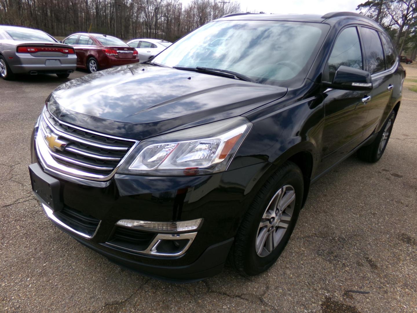 2016 Carbon Flash Metallic /Gray Chevrolet Traverse 2LT FWD (1GNKRHKD2GJ) with an 3.6L V6 DOHC 24V engine, 6-Speed Automatic transmission, located at 401 First NE, Bearden, AR, 71720, (870) 687-3414, 33.726528, -92.611519 - Photo#0